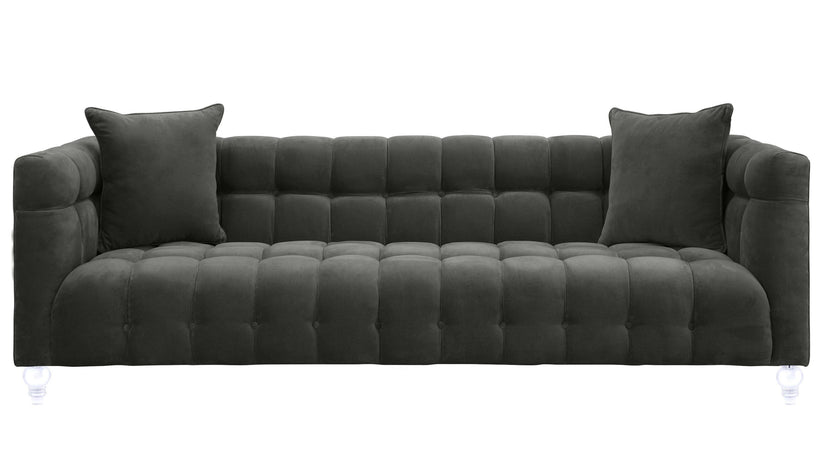 Introducing the Bea Velvet Tufted Sofa, a dark green masterpiece featuring clear acrylic legs and a pair of matching cushions. Its design boasts a modern and plush aesthetic, highlighted by a sophisticated grid-like pattern on the velvet upholstery.