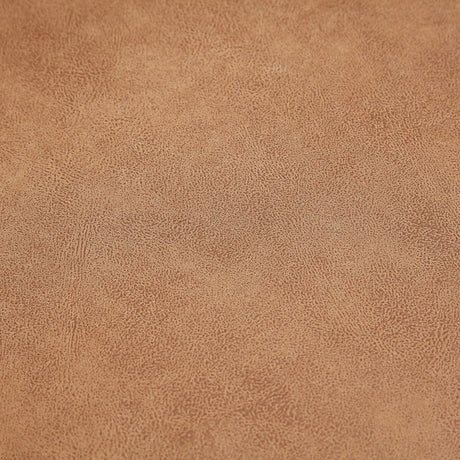 Close-up of a textured brown surface from The 5th Open 116" Left Facing Sectional. The material features a subtle, intricate pattern with small, irregular dots and lines, creating a natural, grainy appearance.