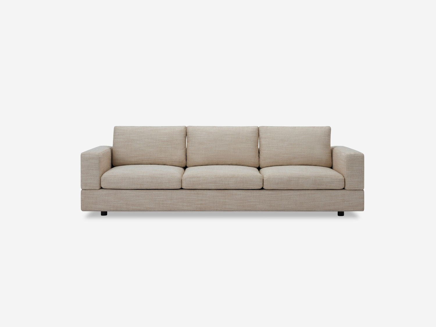 A Stage Track Sofa, featuring a simple and modern design with a beige color, three seats, rectangular cushions, and padded armrests on each side, is set against a plain white background.