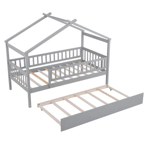 The Creativity House Bed features a gray house-shaped frame with railings and a roof-like design. It includes a twin-size under-bed trundle with slatted support, all displayed against a white background.