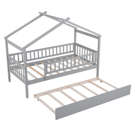 The Creativity House Bed features a gray house-shaped frame with railings and a roof-like design. It includes a twin-size under-bed trundle with slatted support, all displayed against a white background.