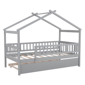 The Creativity House Bed features a gray wooden frame in a house shape with slatted sides and an open roof. It includes a twin size trundle bed pull-out at the bottom, offering a minimalist design ideal for kids' bedrooms.