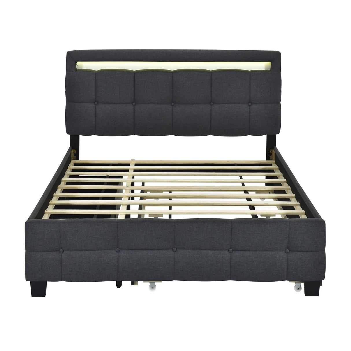 The Upholstered Platform Bed with LED Frame, featuring a modern black design and a tall tufted headboard with built-in lighting, showcases wooden slats and exudes a sleek, contemporary style. It includes a trundle and two drawers for added functionality.