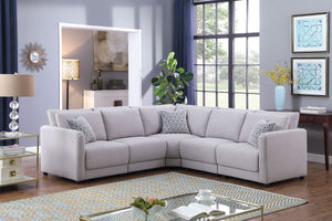 Penelope - Fabric Reversible Modular Sectional Sofa With Ottoman And Pillows by Couch.com