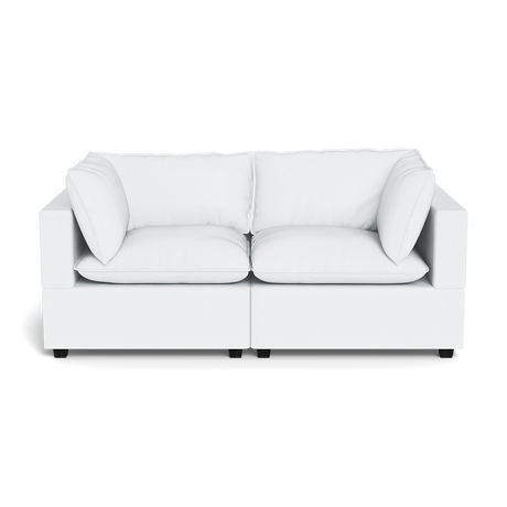The Kova Pillow Cushion Sofa 86" is a modern white two-seater with square arms and plush cushions, shown against a plain black background.