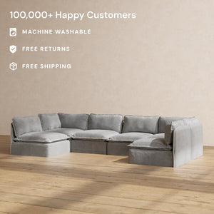 The Modular Performance 6-Seater Open-Ends U-Sectional Plush Weave Ash is placed on a wooden floor against a plain beige wall. Text highlights "100,000+ Happy Customers," "Machine Washable," "Free Returns," and "Free Shipping.