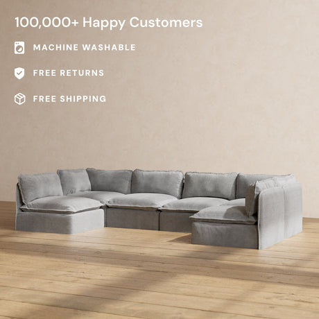 The Modular Performance 6-Seater Open-Ends U-Sectional Plush Weave Ash is placed on a wooden floor against a plain beige wall. Text highlights "100,000+ Happy Customers," "Machine Washable," "Free Returns," and "Free Shipping.