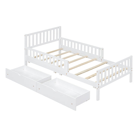 The Platform Bed With Guardrails On Both Sides And 2 Storage Drawers is crafted in white wood with slatted sides and a slatted base. It features two pull-out storage drawers underneath, providing simple and clean design ideal for a child's room.