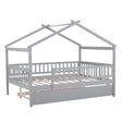 The Creativity House Bed features a gray wooden frame with a pitched roof and open slats, includes side safety rails, and a twin-size trundle drawer.