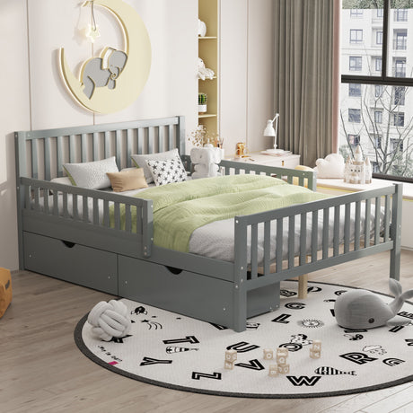A child's bedroom includes a Platform Bed with guardrails, a green comforter, and under-bed storage drawers. A round alphabet rug lies on the floor amidst plush toys and blocks. The window view features a building and trees outside.