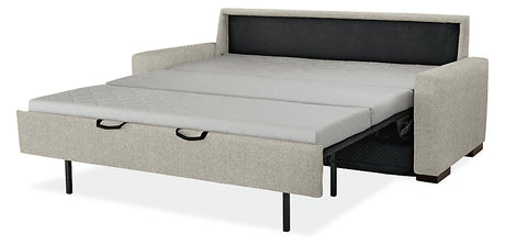 The Berin Day & Night Sleeper Sofa is fully extended with a thin, quilted-patterned mattress. It features a simple design with square armrests and dark legs in a gray fabric.