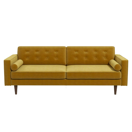 The Casey Mid Century Modern Sofa features a mustard yellow color, button-tufted back cushions, two cylindrical bolster pillows, and wooden tapered legs.