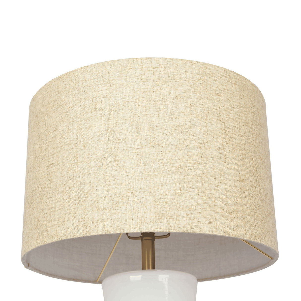 The Cascade table lamp features a beige fabric lampshade in a simple cylindrical design, set on a white bulb holder with a brass-like support structure, all against a plain white background.