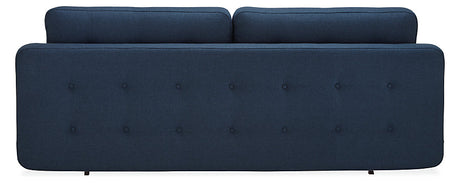 Rear perspective of the Deco Convertible Sleeper Sofa, showcasing its modern, tufted design in a dark blue hue. This sofa boasts a sleek and minimalist form with two cushions lining the top and petite legs for an elegant appearance.