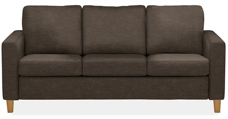 The Berin Day & Night Sleeper Sofa features a modern and minimalistic design, with plush cushions, straight armrests, and wooden legs. It is a brown three-seater set against a white background.