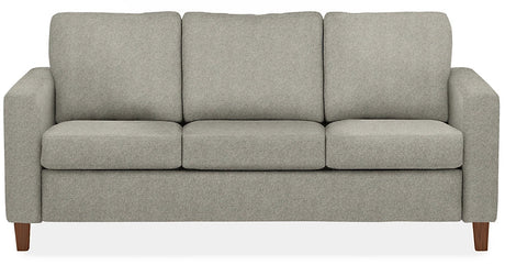 The Berin Day & Night Sleeper Sofa is a gray, modern three-cushion sofa featuring wooden legs.