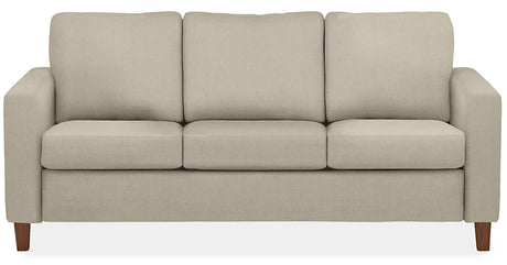 The Berin Day & Night Sleeper Sofa is a beige three-seater with wooden legs and rectangular cushions.
