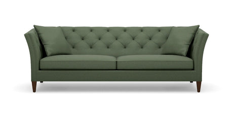 Introducing the Shelton 98" Sofa: This green, tufted sofa includes two seat cushions and two back pillows. It showcases a modern design with tall, angled armrests and tapered wooden legs.