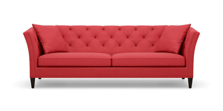 Introducing the Shelton 98" Sofa: a stunning red tufted design complete with two cushions, flared arms, and dark wooden legs, all showcased against a plain white background.