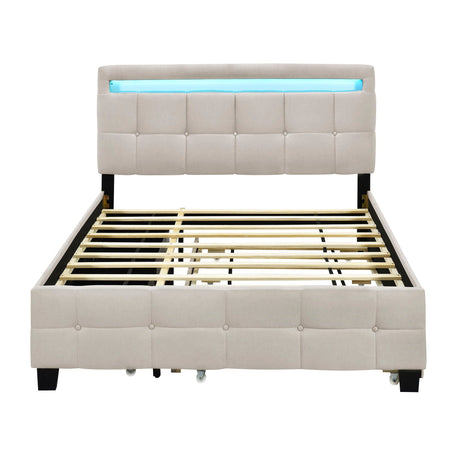 A beige Upholstered Platform Bed with a tufted headboard, featuring an upper horizontal LED light strip, black legs, wooden slats, and no mattress. It includes a trundle and two drawers.
