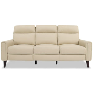 The Elliot - Incliner Sofa Left is a beige, three-seater with cushioned backrests and armrests. It features a smooth, leather-like texture and dark, tapered wooden legs against a simple light background.