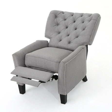 A Modern Push Back Recliner in gray features a tufted backrest, studded detailing, extended footrest, and dark wooden legs.