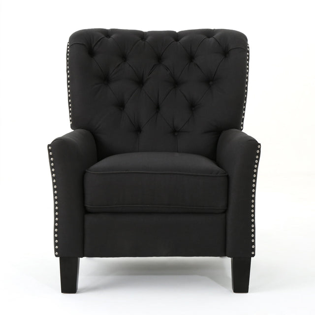 The Modern Push Back Recliner is a black tufted armchair featuring a high backrest, cushioned seat, and studded detailing along the arms. It has black wooden legs and is set against a plain white background.