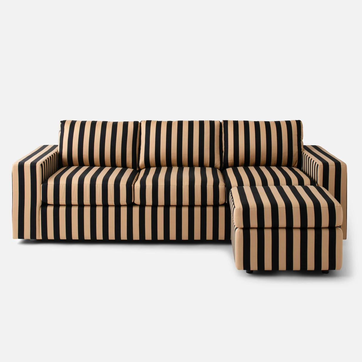 The Marc Striped Sofa is a stylish L-shaped piece featuring bold vertical stripes in black and beige. It boasts thick cushions and wide armrests, all set against a plain white background.