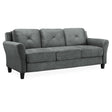 The iLounge Harvard Microfiber Sofa, featuring a gray finish and plush cushions for seating three, showcases rounded armrests and stands on short, dark wooden legs. Its upholstery includes subtle button tufting on the backs of the cushions and is set against a plain white background.