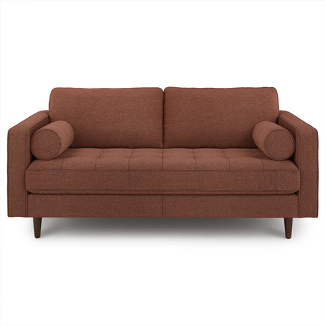 The Sven 72 Tufted Loveseat Ratine Oxide is a modern piece featuring clean lines and a tufted seat. It includes two cylindrical bolster cushions and rests on four wooden legs, embodying a minimalist design that emphasizes both comfort and style.