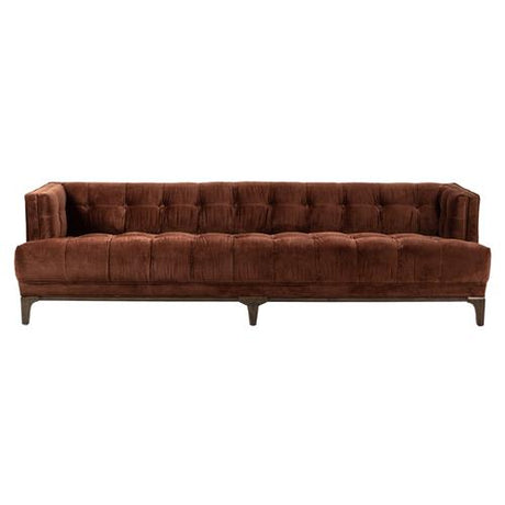 A long green mid-century velvet sofa with button tufting and a low brown wooden frame. The design is modern, featuring straight arms and a boxy shape, making it suitable for contemporary living rooms.