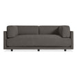 The Sunday 82" Sofa in Kelso Charcoal features a modern design with dark gray upholstery, clean lines, low arms, and short black legs, shown against a white background.