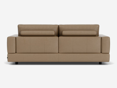 Back view of the Stage Track Sofa, a modern piece crafted in brown leather featuring adjustable headrests and short black legs. This sofa boasts a sleek, minimalist design, making it ideal for contemporary interiors.