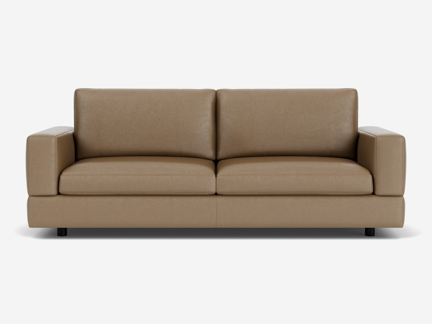 The Stage Track Sofa, featuring a minimalist design with thick cushions and square armrests, is showcased against a white background. Its brown leather upholstery and sleek, contemporary style are enhanced by short black legs.