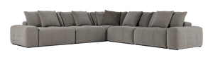 The Fullerton Modular Sofa 04 is a large, gray sectional sofa that offers plush cushions. It is configured in an L-shape and showcases a modern, minimalistic design with deep seating and broad armrests.