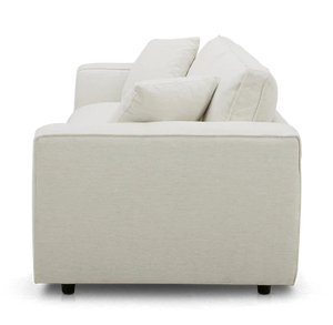 Side view of the Elmore Sofa, a modern beige piece with clean lines and two cushion accents. This sofa features a minimalist design and plush seating.