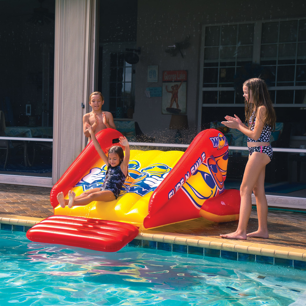 WOW Sports Slide N Smile Inflatable Pool Slide with Sprinklers for Kids and Adults (21-2500-WOW) by Jupiter Gear